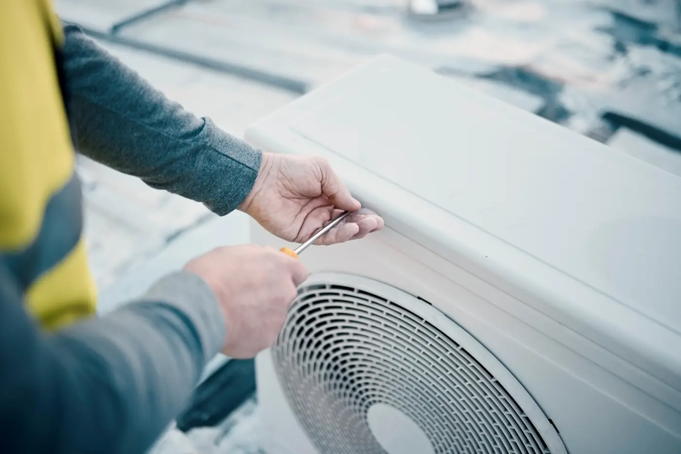 air conditioning maintenance by technician