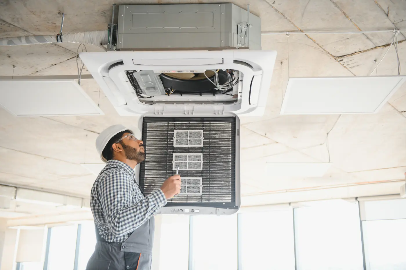 commercial air vent filter change by technician