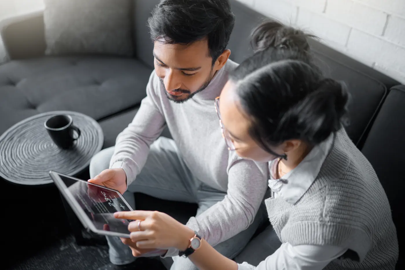 couple trying out their new shmart thermostat