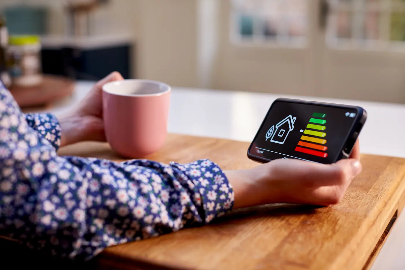 lady drinking coffee while measuring hvac energy efficiency
