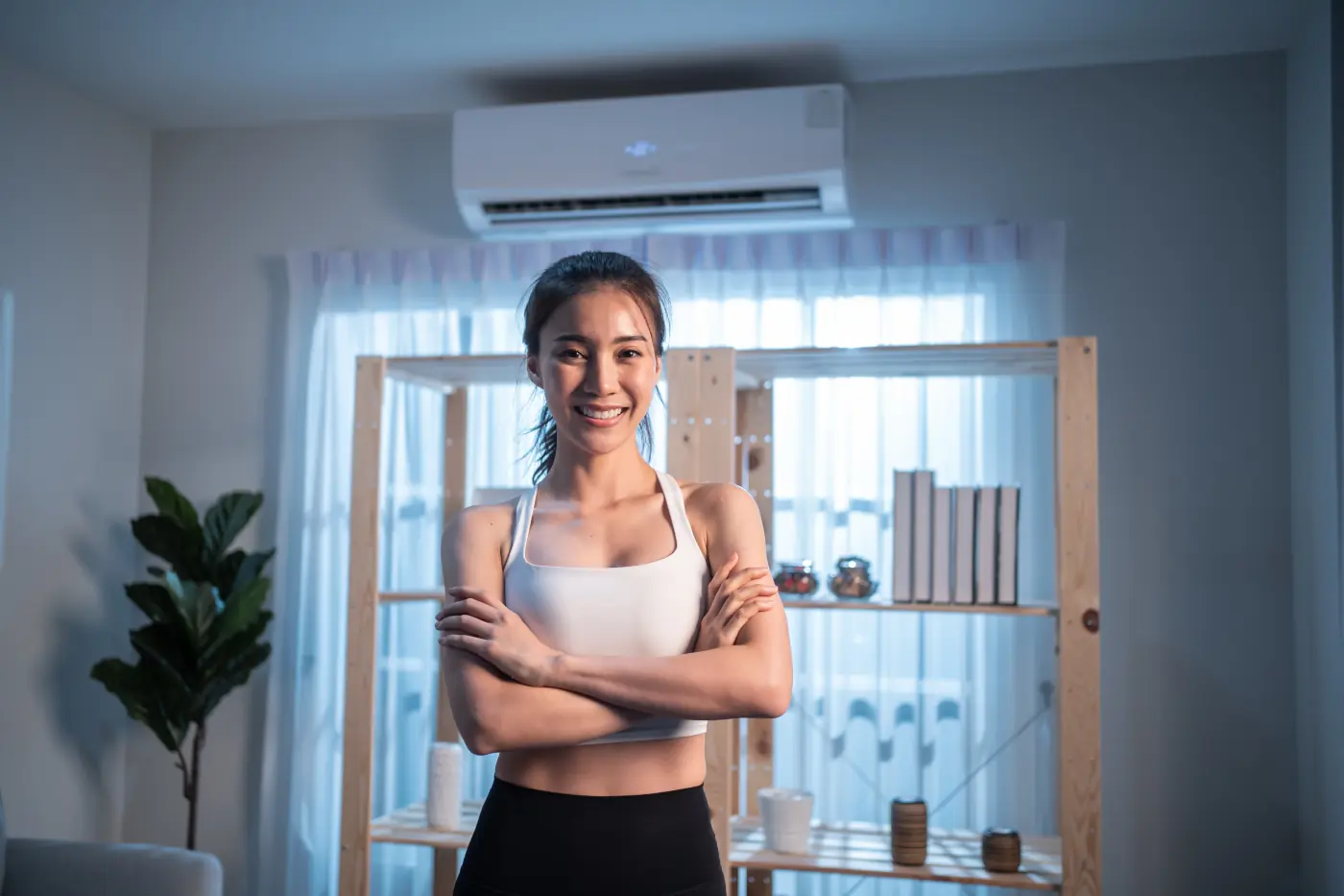 Borts-HVAC mini split turned on happy woman